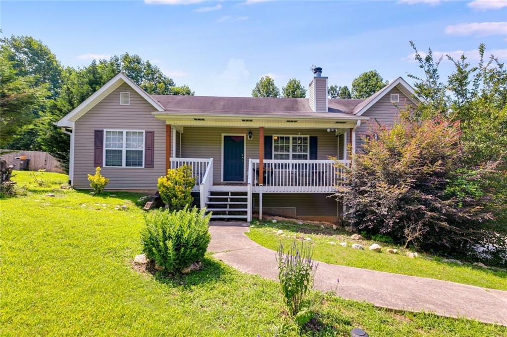 80 Jacob Trail Rockmart, GA 30153 - Photo 1 of 24 a view of house with a yard and potted plants