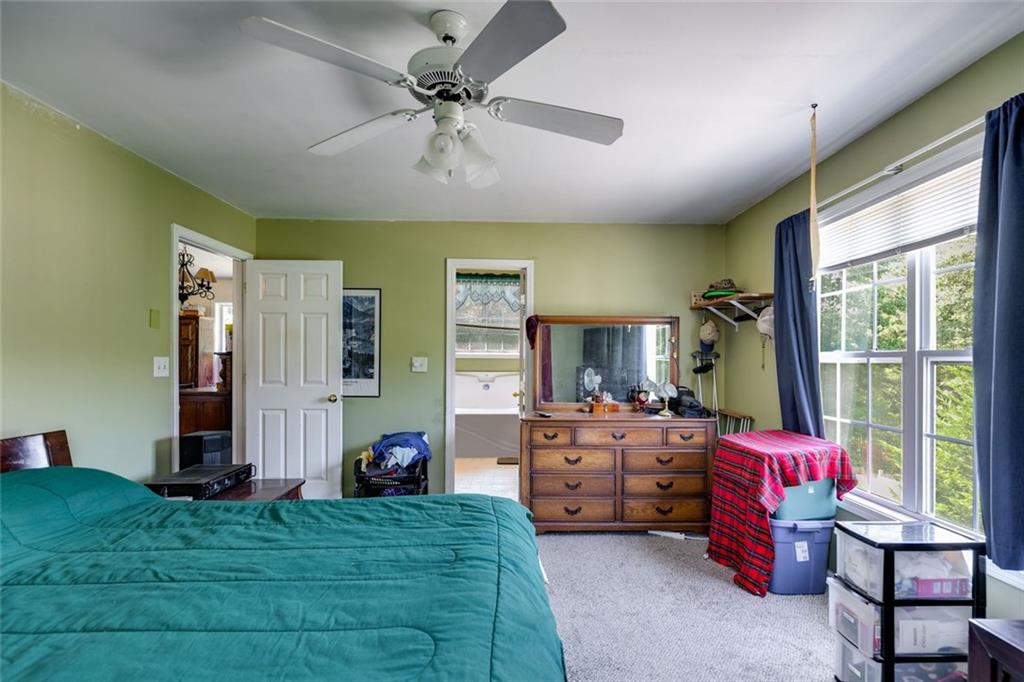 80 Jacob Trail Rockmart, GA 30153 - Photo 12 of 24 a bedroom with furniture and a large window