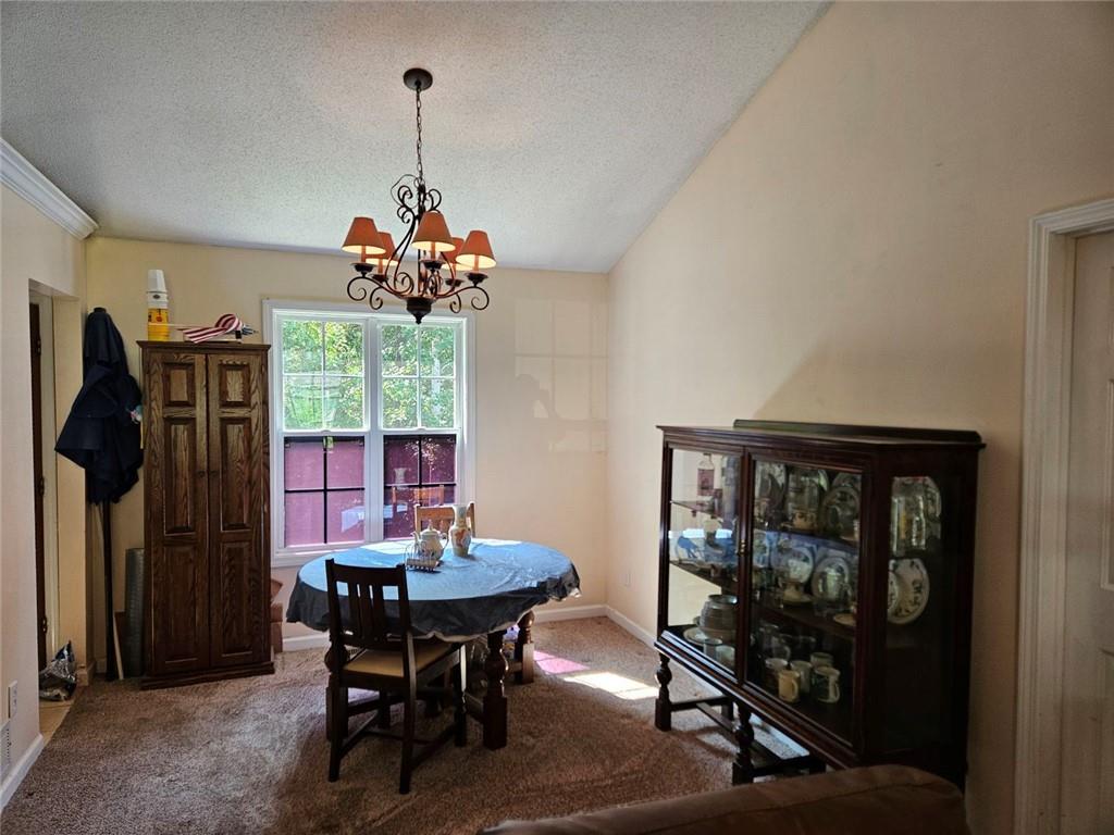 80 Jacob Trail Rockmart, GA 30153 - Photo 7 of 24 a view of a dining room with furniture and window