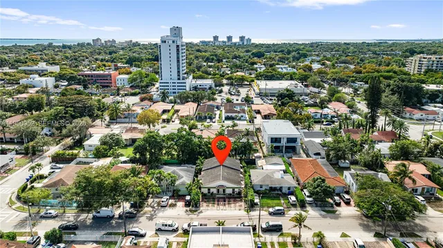 an aerial view of a city with lots of residential buildings