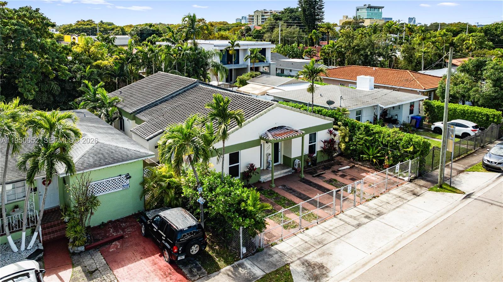 1428 Southwest 20th Street Miami, FL 33145 - Photo 10 of 63 an aerial view of a houses with yard