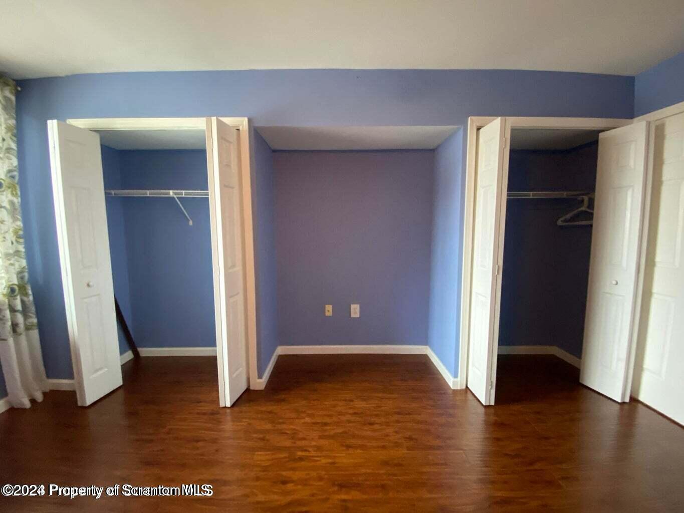 1702 Summit Pointe Scranton, PA 18508 - Photo 18 of 30 an empty room with wooden floor and closet