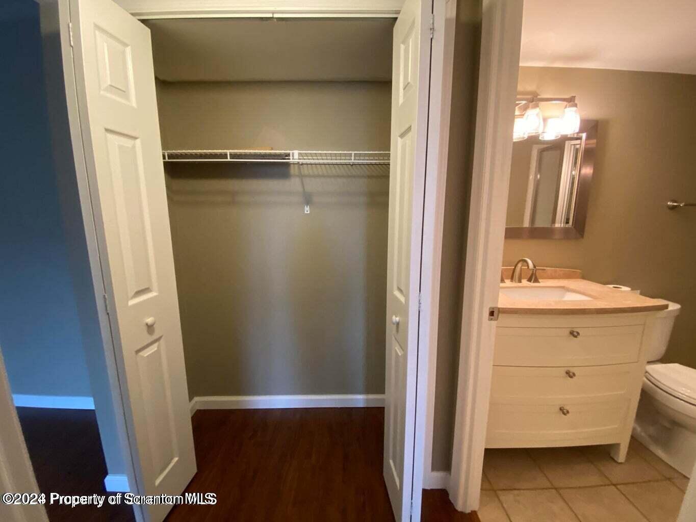 1702 Summit Pointe Scranton, PA 18508 - Photo 20 of 30 a bathroom with a sink and a mirror
