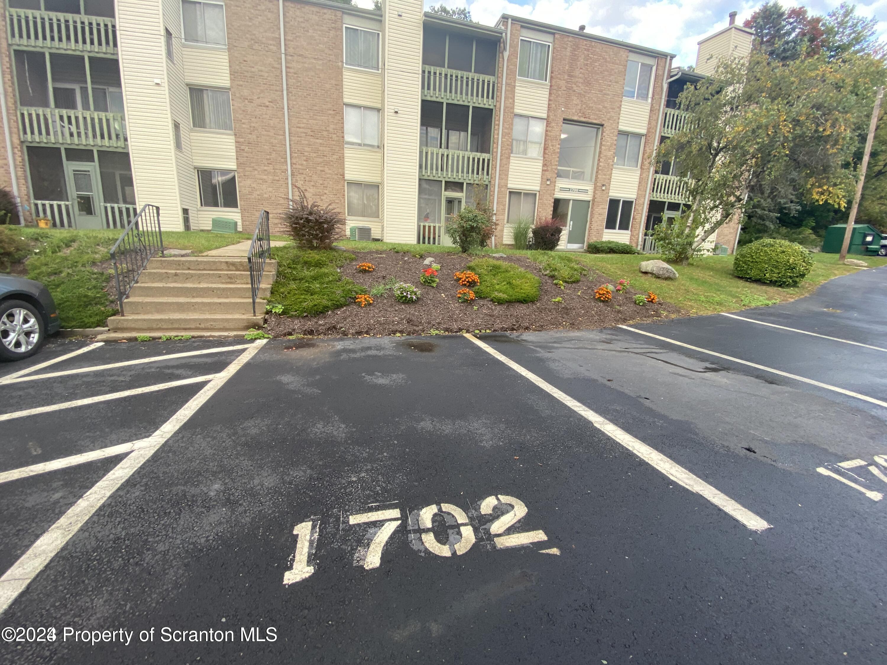 1702 Summit Pointe Scranton, PA 18508 - Photo 2 of 30 a front view of a building with street view