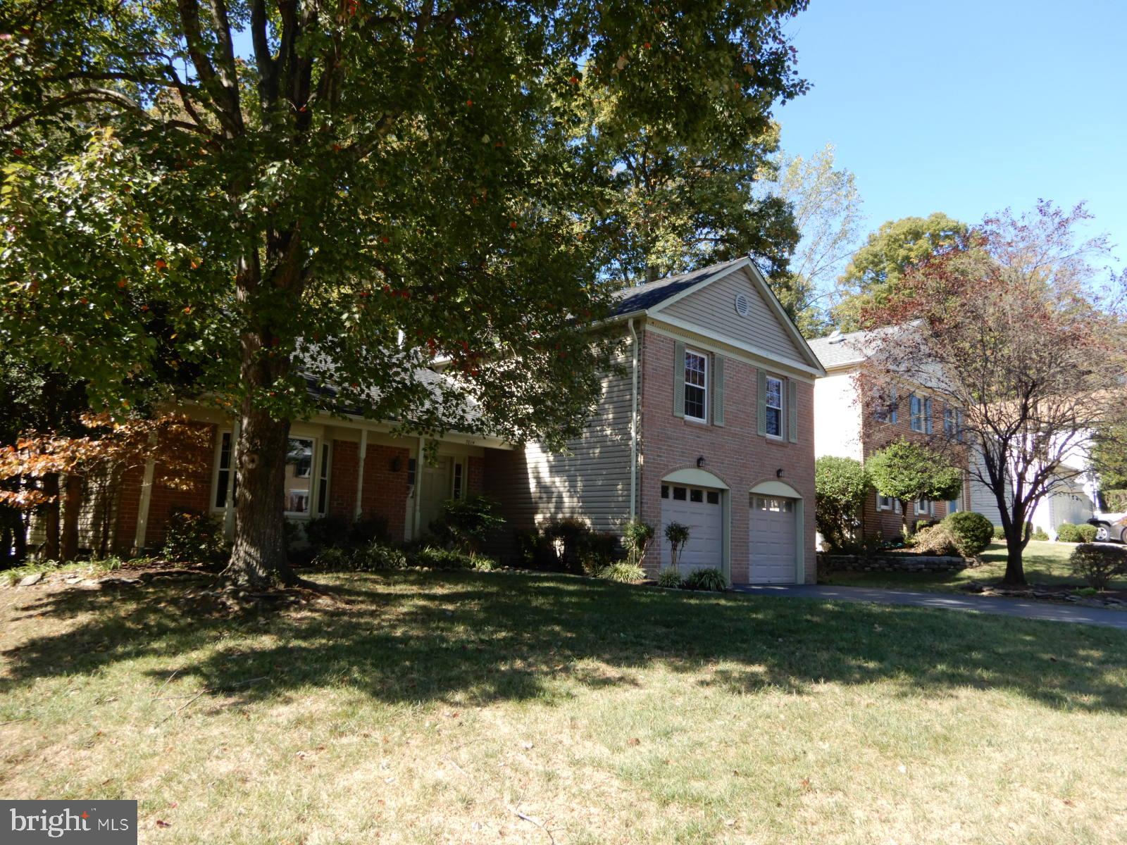 7014 Maple Tree Lane Springfield, VA 22152 - Photo 55 of 56 a front view of house with yard and trees around