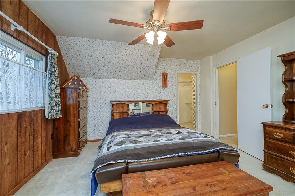 422 Mars Road Mars, PA 16046 - Photo 14 of 19 a bedroom with a bed and a dresser