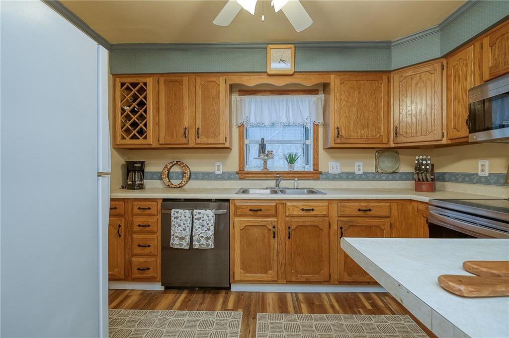 422 Mars Road Mars, PA 16046 - Photo 9 of 19 a kitchen with stainless steel appliances granite countertop a sink and cabinets