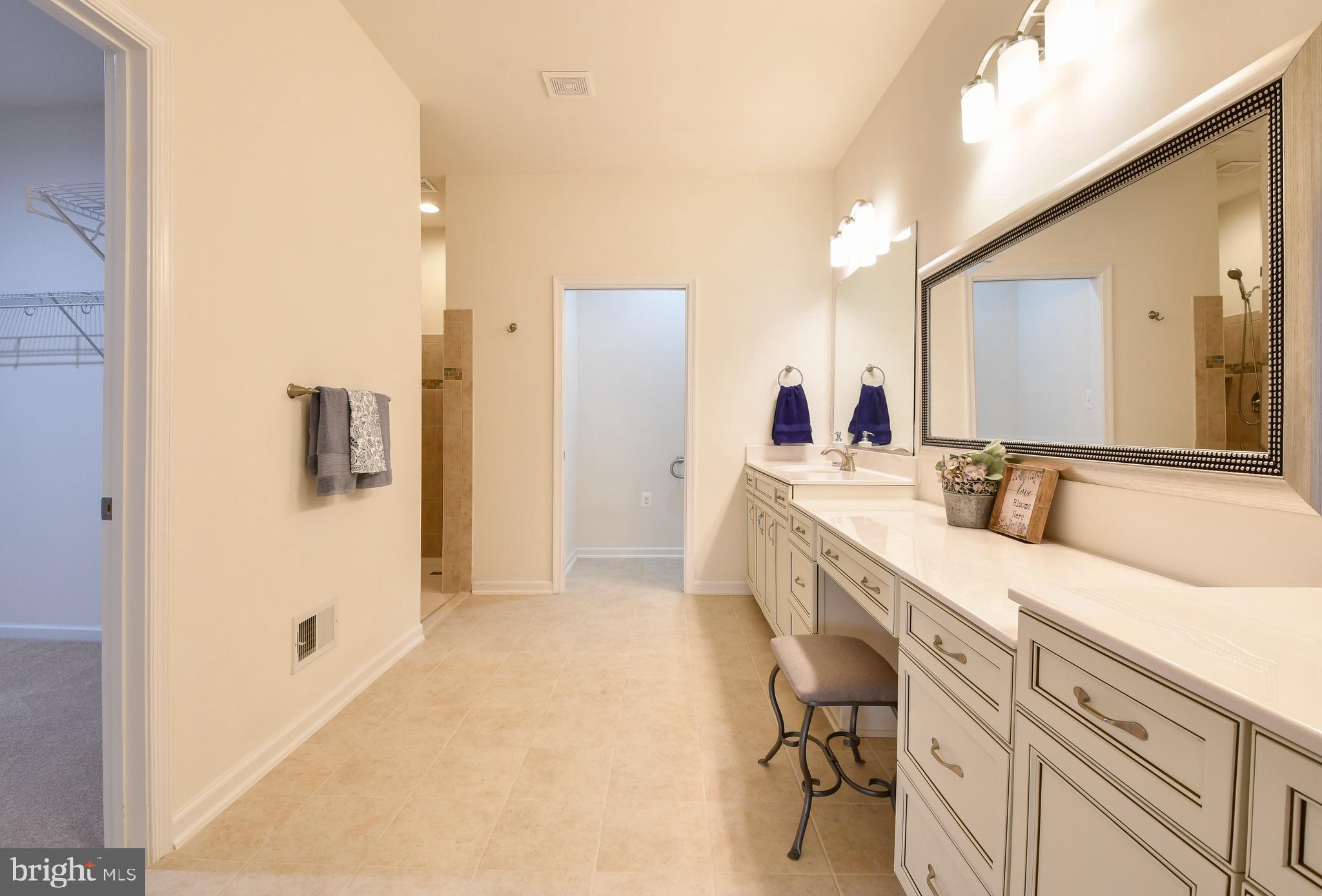 12413 Ruby Red Drive Fredericksburg, VA 22407 - Photo 23 of 54 Huge primary bath w/ double & sit down vanity.