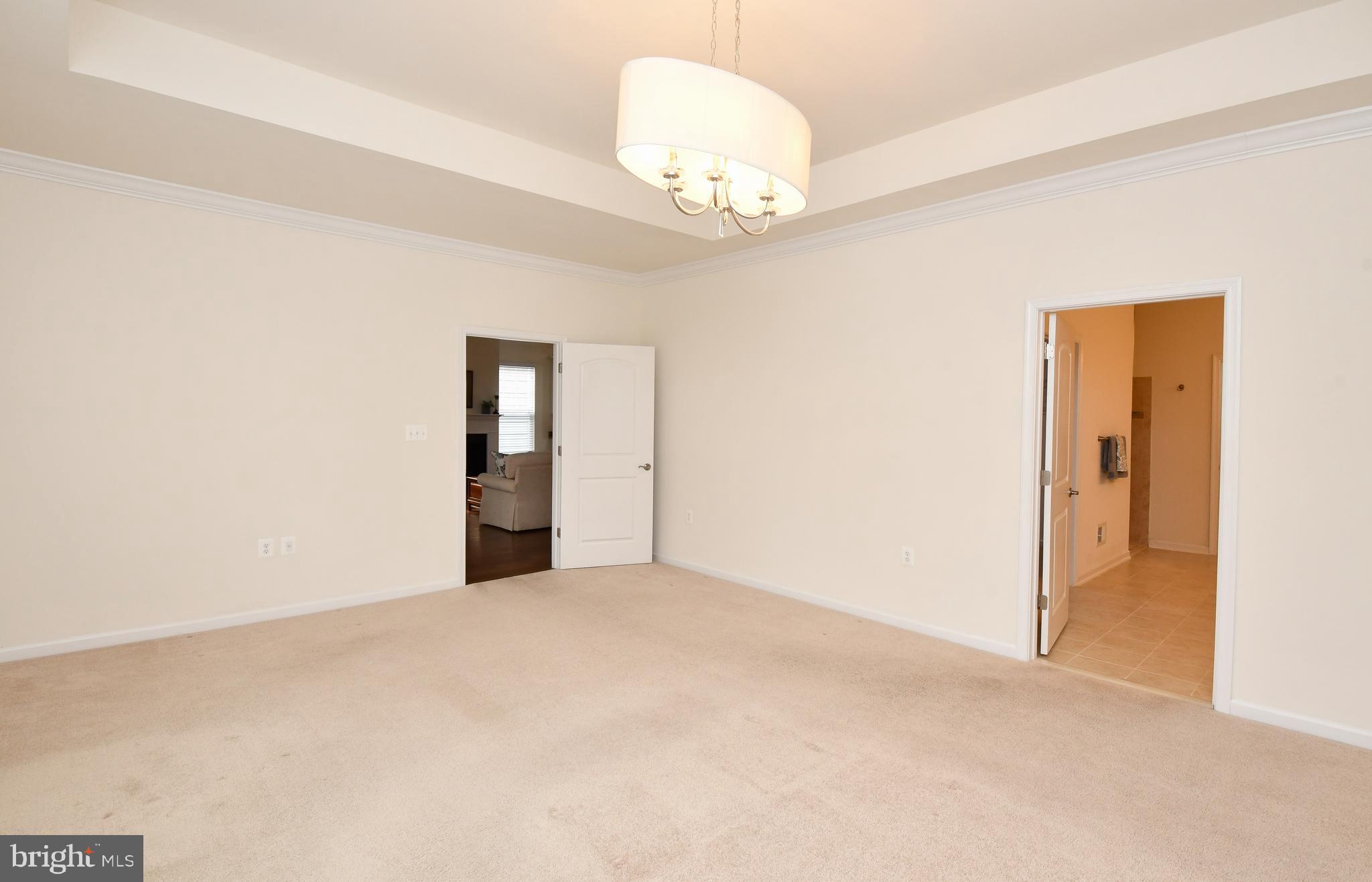 12413 Ruby Red Drive Fredericksburg, VA 22407 - Photo 30 of 54 Large primary bedroom and ensuite bath