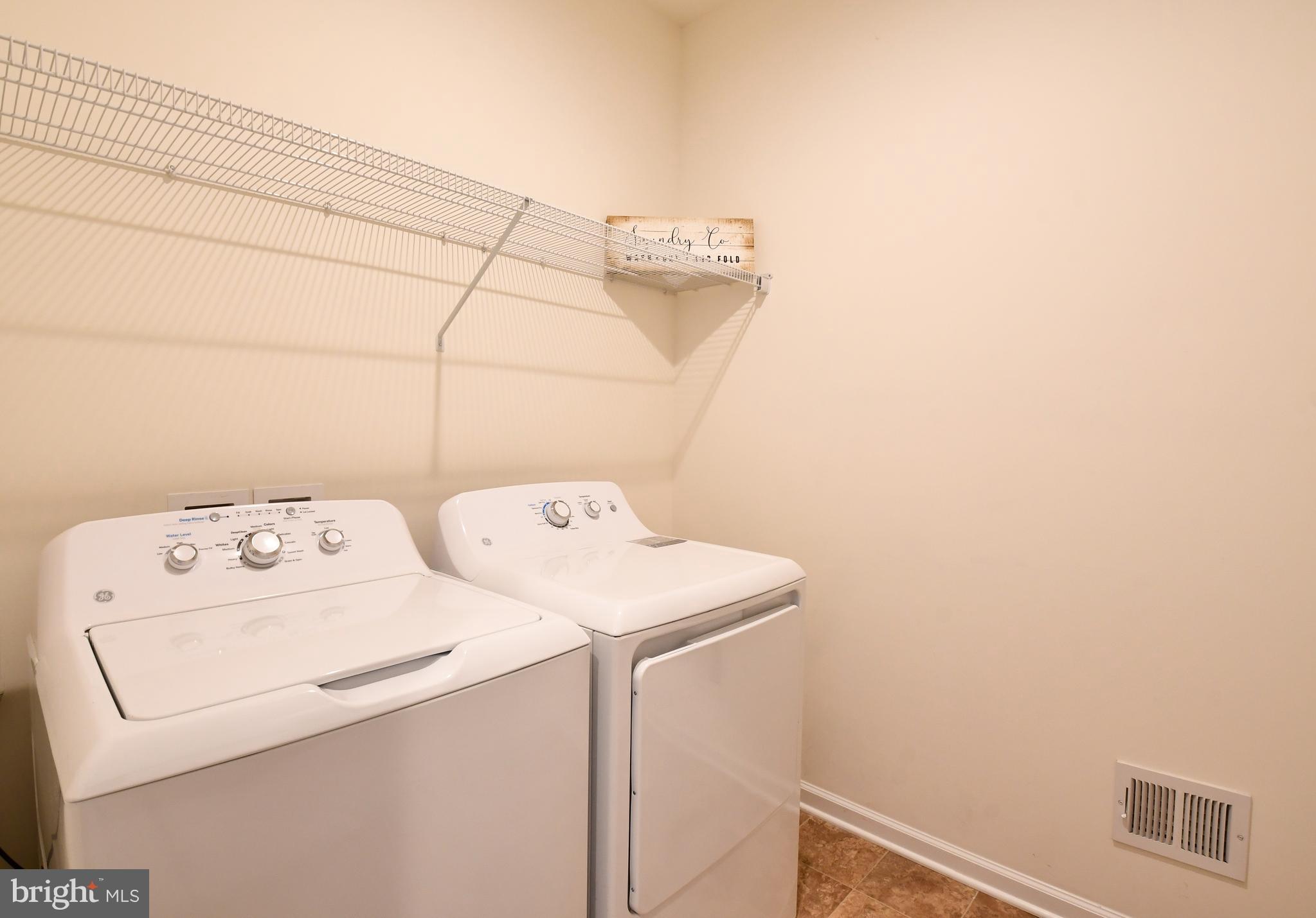 12413 Ruby Red Drive Fredericksburg, VA 22407 - Photo 33 of 54 Laundry room with shelf for hanging clothes
