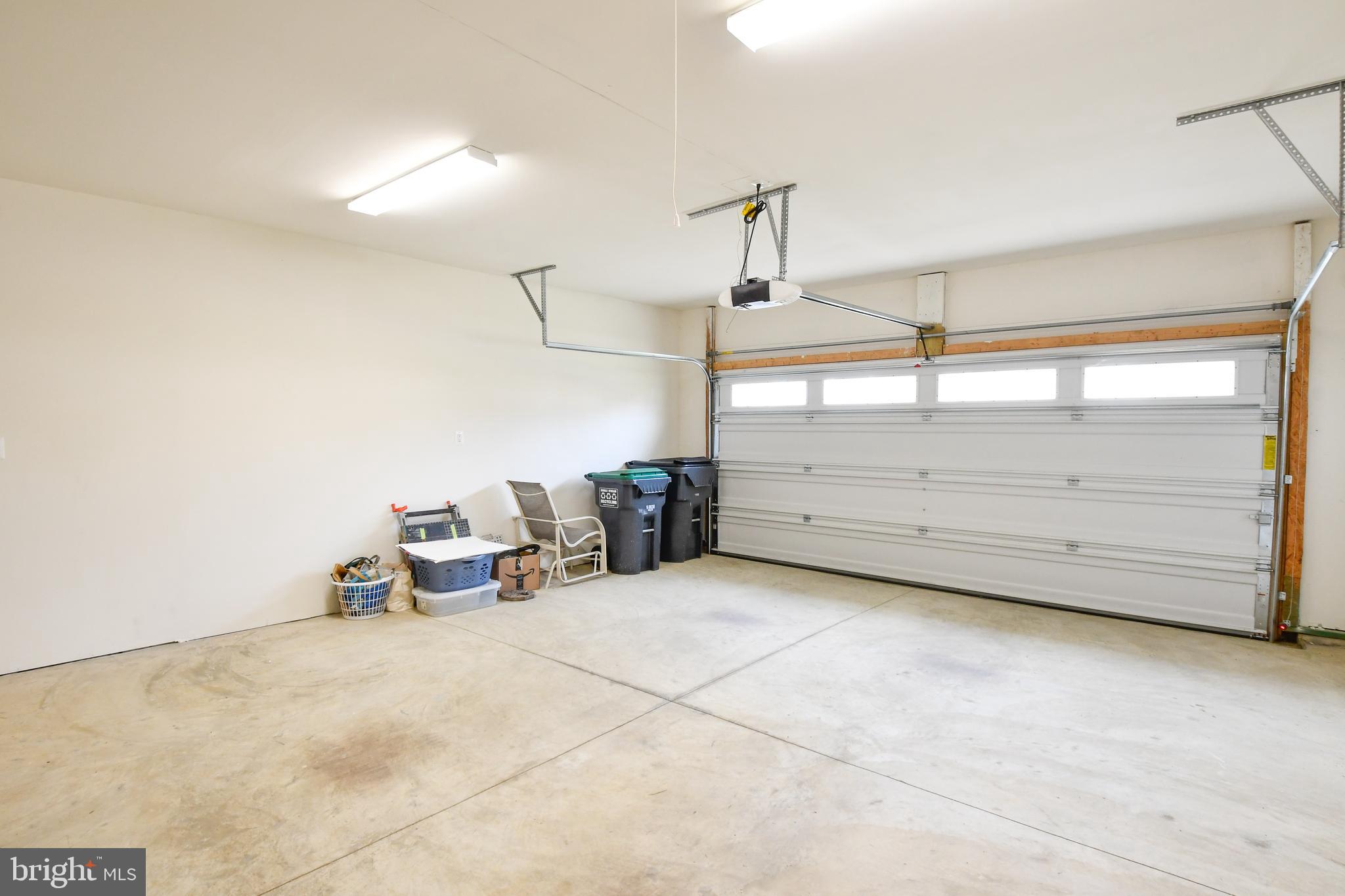 12413 Ruby Red Drive Fredericksburg, VA 22407 - Photo 43 of 54 Garage has painted walls & extra outlets
