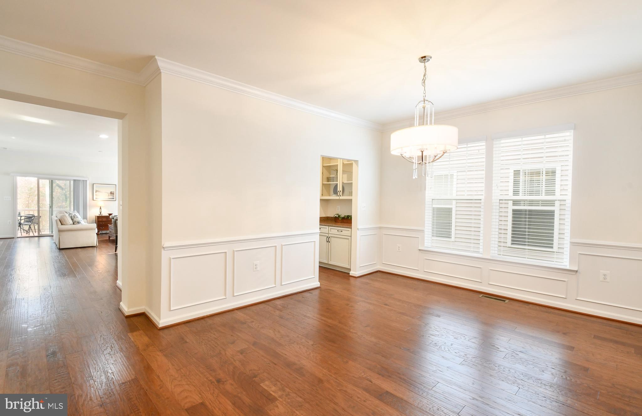 12413 Ruby Red Drive Fredericksburg, VA 22407 - Photo 7 of 54 Formal dining room-beautiful trim work, hardwood