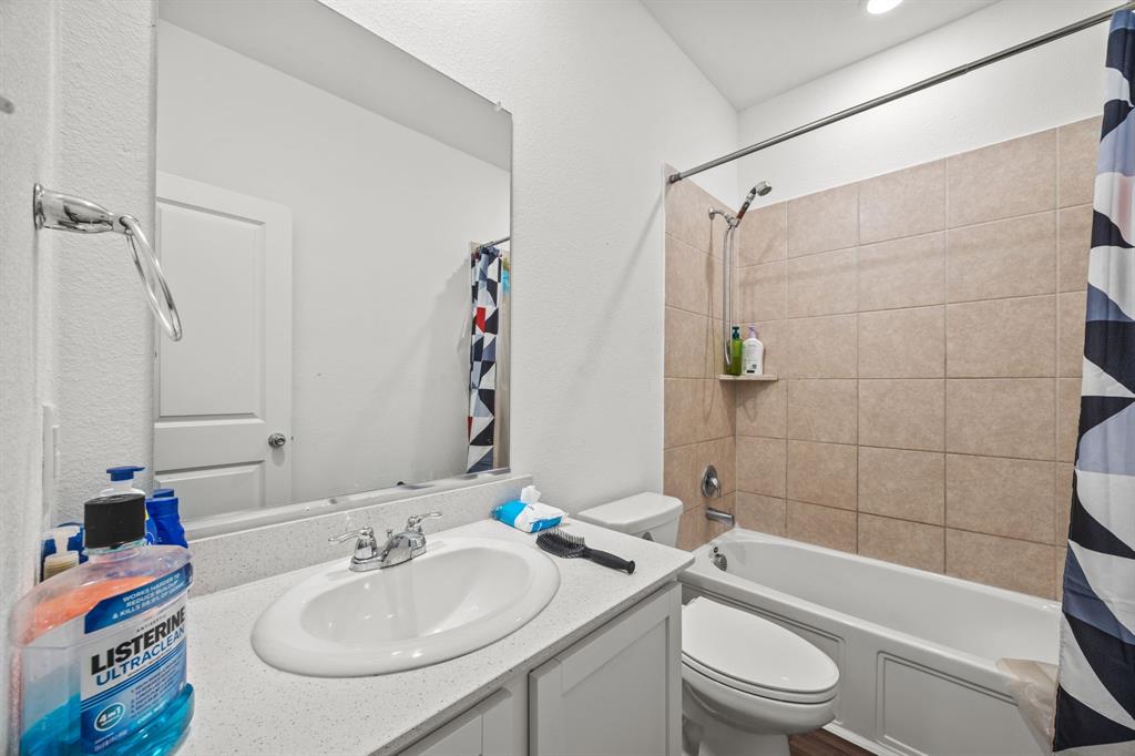 753 Lombard Lane Forney, TX 75126 - Photo 14 of 25 Full bath featuring vanity and shower / bath combo