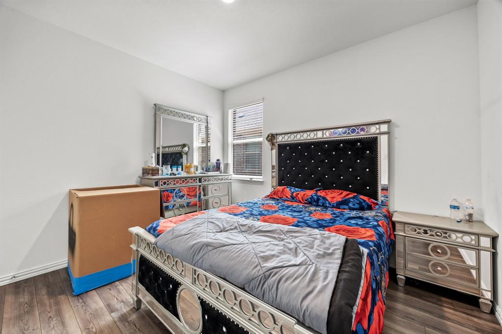 753 Lombard Lane Forney, TX 75126 - Photo 16 of 25 Bedroom featuring wood finished floors