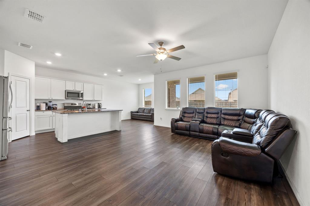 753 Lombard Lane Forney, TX 75126 - Photo 5 of 25 Living area featuring ceiling fan, dark wood-style flooring, and recessed lighting