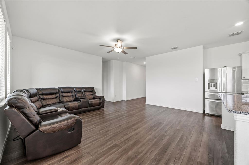 753 Lombard Lane Forney, TX 75126 - Photo 7 of 25 Living area featuring a ceiling fan, dark wood finished floors, and recessed lighting