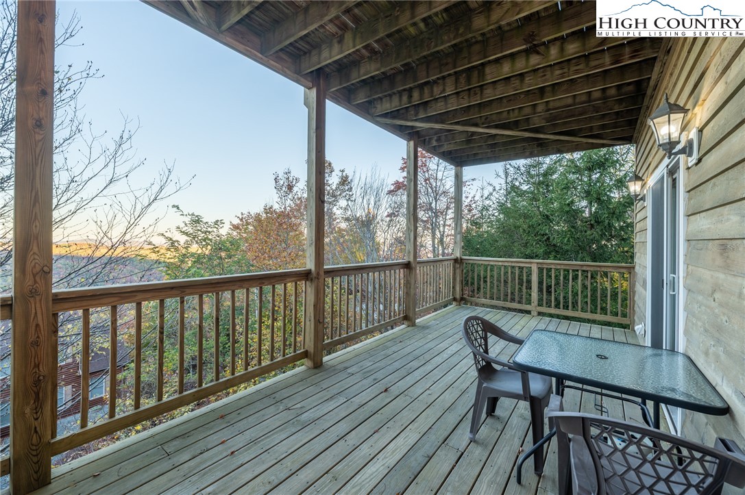309 Pinnacle Ridge Road Beech Mountain, NC 28604 - Photo 24 of 45 a view of a two chairs on the roof deck