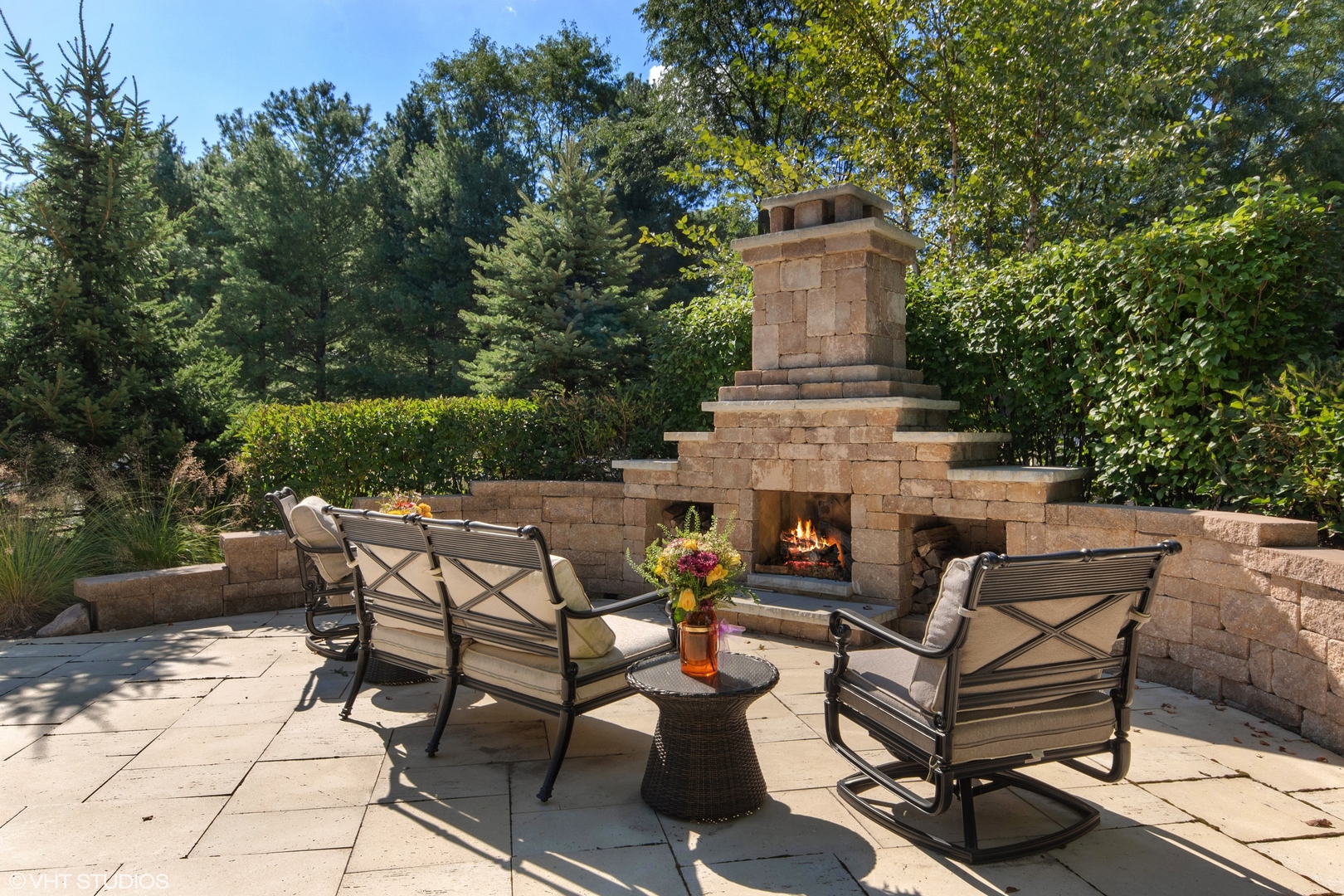 11 Moate Lane Barrington Hills, IL 60010 - Photo 49 of 71 a view of a patio with table and chairs and potted plants