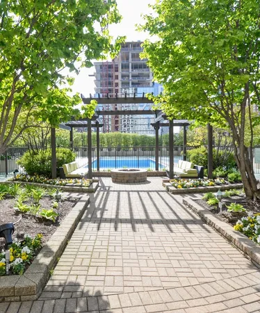a view of a swimming pool with a patio