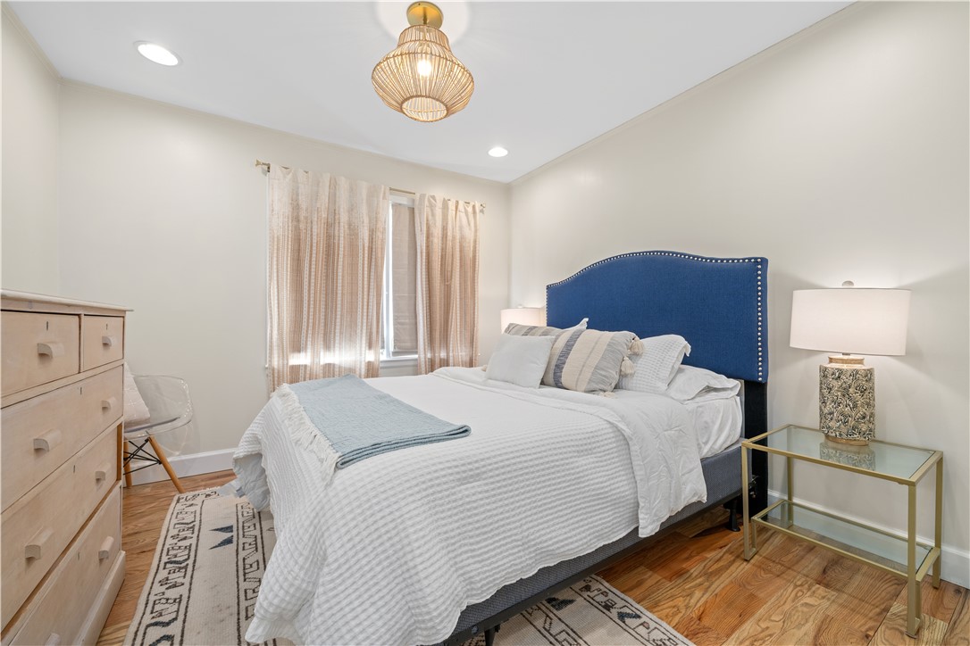640 Old Salem Road Seneca, SC 29672 - Photo 14 of 32 This tranquil bedroom offers comfort and a peaceful retreat with warm wood floors.