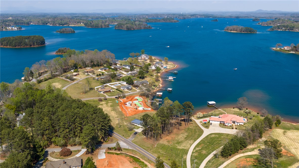 640 Old Salem Road Seneca, SC 29672 - Photo 25 of 32 This captivating aerial view showcases a vibrant waterfront community with breathtaking lake views.