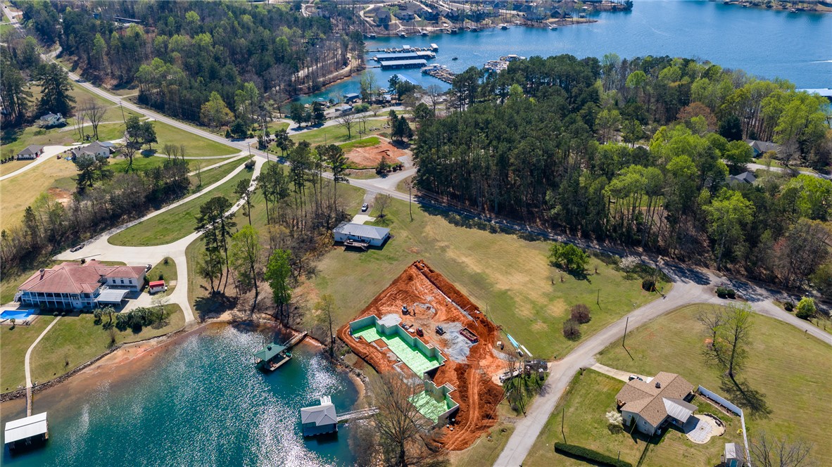 640 Old Salem Road Seneca, SC 29672 - Photo 28 of 32 This aerial view showcases a waterfront property with ample space for custom construction and established homes.