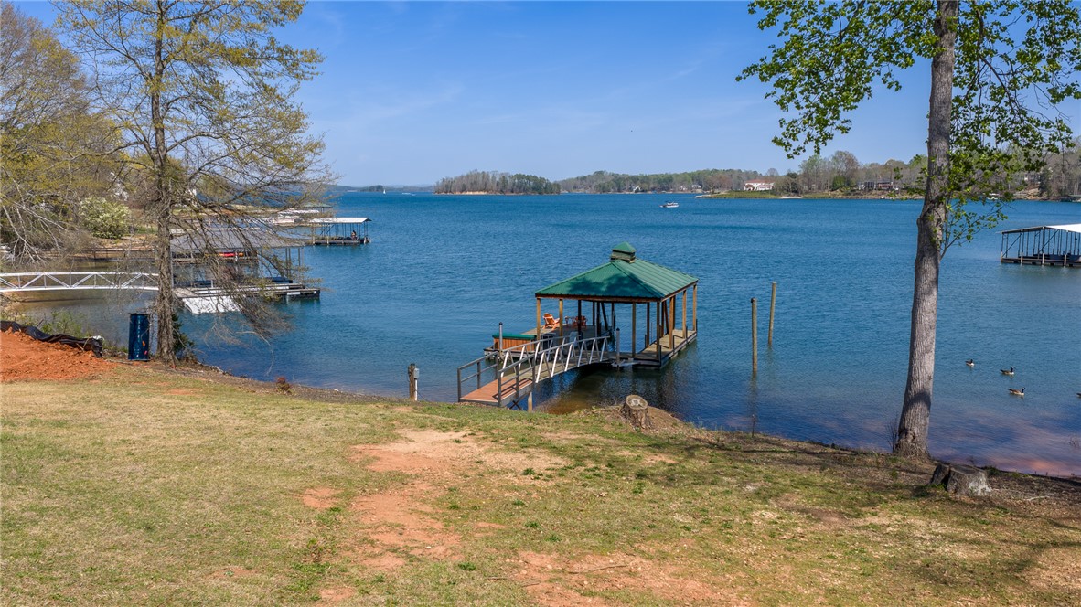 640 Old Salem Road Seneca, SC 29672 - Photo 31 of 32 This tranquil waterfront property features a private dock and gazebo, perfect for lakeside relaxation.