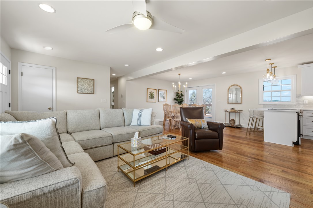 640 Old Salem Road Seneca, SC 29672 - Photo 4 of 32 Bright and open living space with gleaming hardwood floors connects effortlessly to the kitchen and dining area.