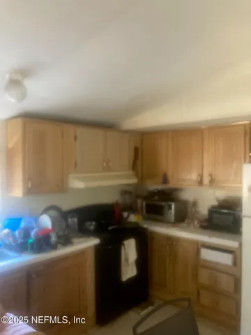 a room with a bed and a window