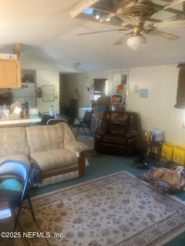 a view of a utility room with cabinet