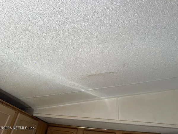 a living room with furniture and rug