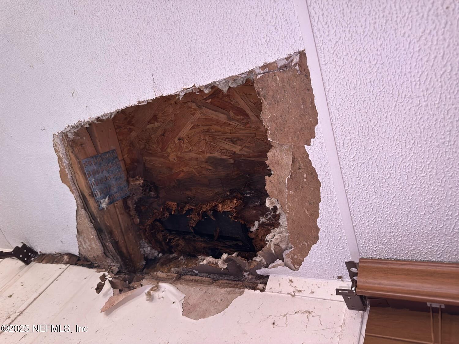 12491 Northeast 88th Lane Bronson, FL 32621 - Photo 27 of 183 a view of folding clothes and shoes