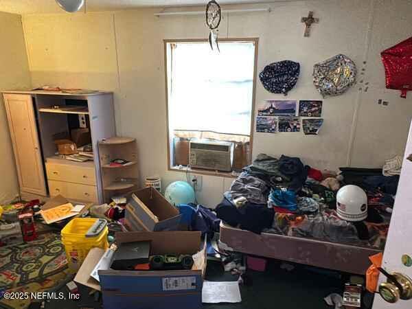 12491 Northeast 88th Lane Bronson, FL 32621 - Photo 40 of 183 a living room with furniture and a window