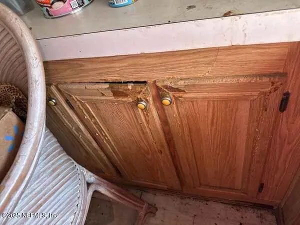 a close up of a swimming pool with a outdoor seating