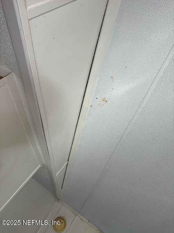 12491 Northeast 88th Lane Bronson, FL 32621 - Photo 51 of 183 a view of staircase with white walls