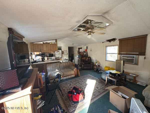 12491 Northeast 88th Lane Bronson, FL 32621 - Photo 61 of 183 a living room with furniture kitchen view and a window
