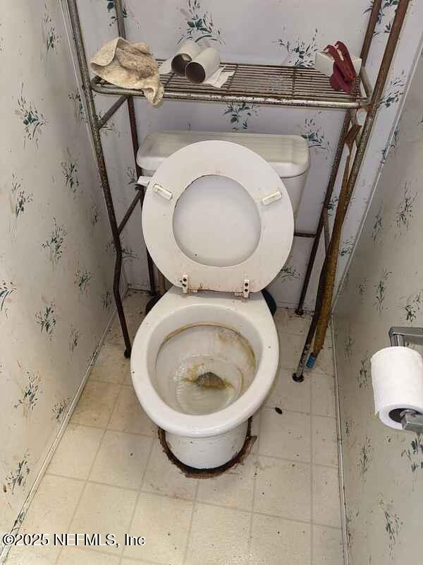 12491 Northeast 88th Lane Bronson, FL 32621 - Photo 71 of 183 a close view of a toilet in a bathroom