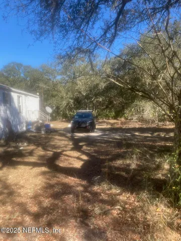 a view of folding clothes and shoes