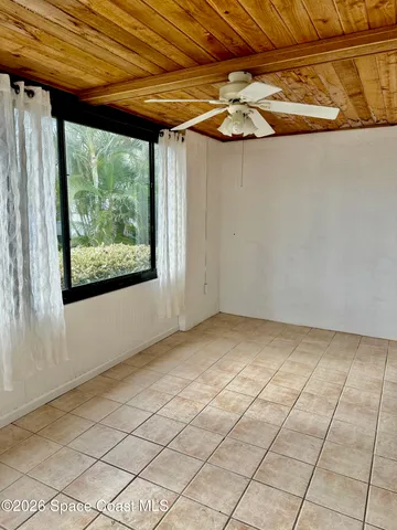 a view of a house with a garden