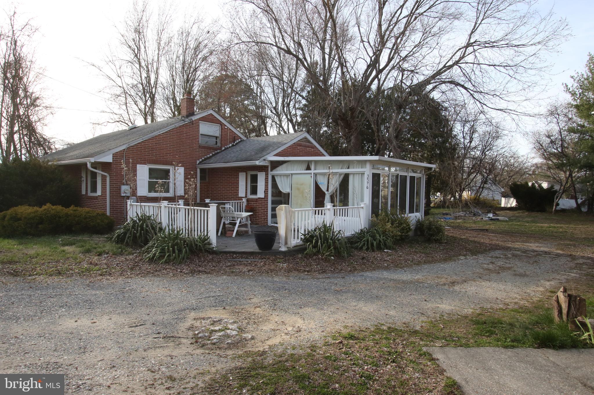 3576 Walnut Shade Road Camden Wyoming, DE 19934 - Photo 12 of 37 a front view of a house with a garden