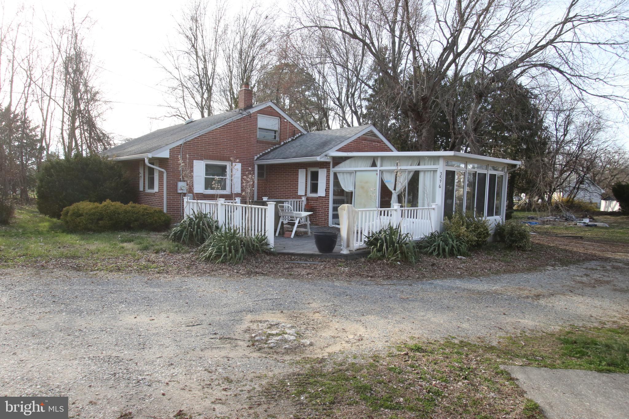 3576 Walnut Shade Road Camden Wyoming, DE 19934 - Photo 13 of 37 a front view of a house with garden