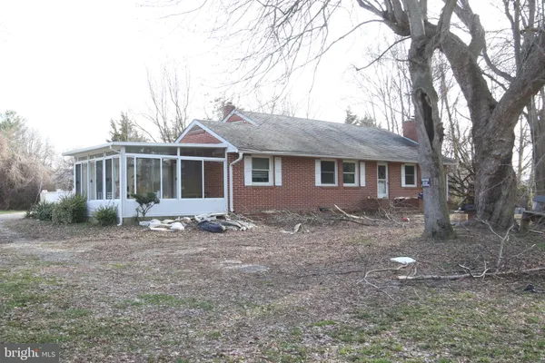 a backyard of a house with seating space
