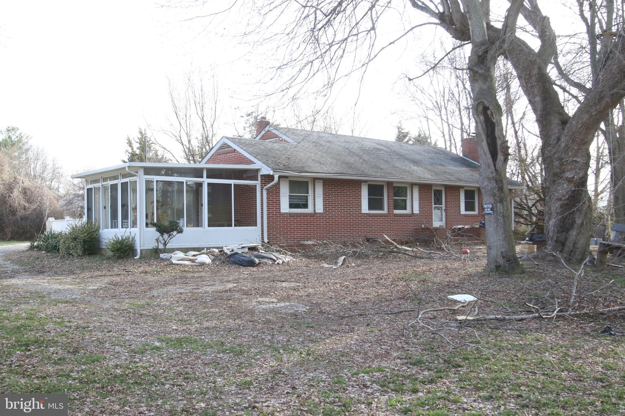 3576 Walnut Shade Road Camden Wyoming, DE 19934 - Photo 17 of 37 a backyard of a house with seating space