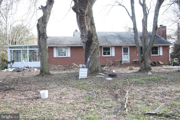 a backyard of a house with seating space