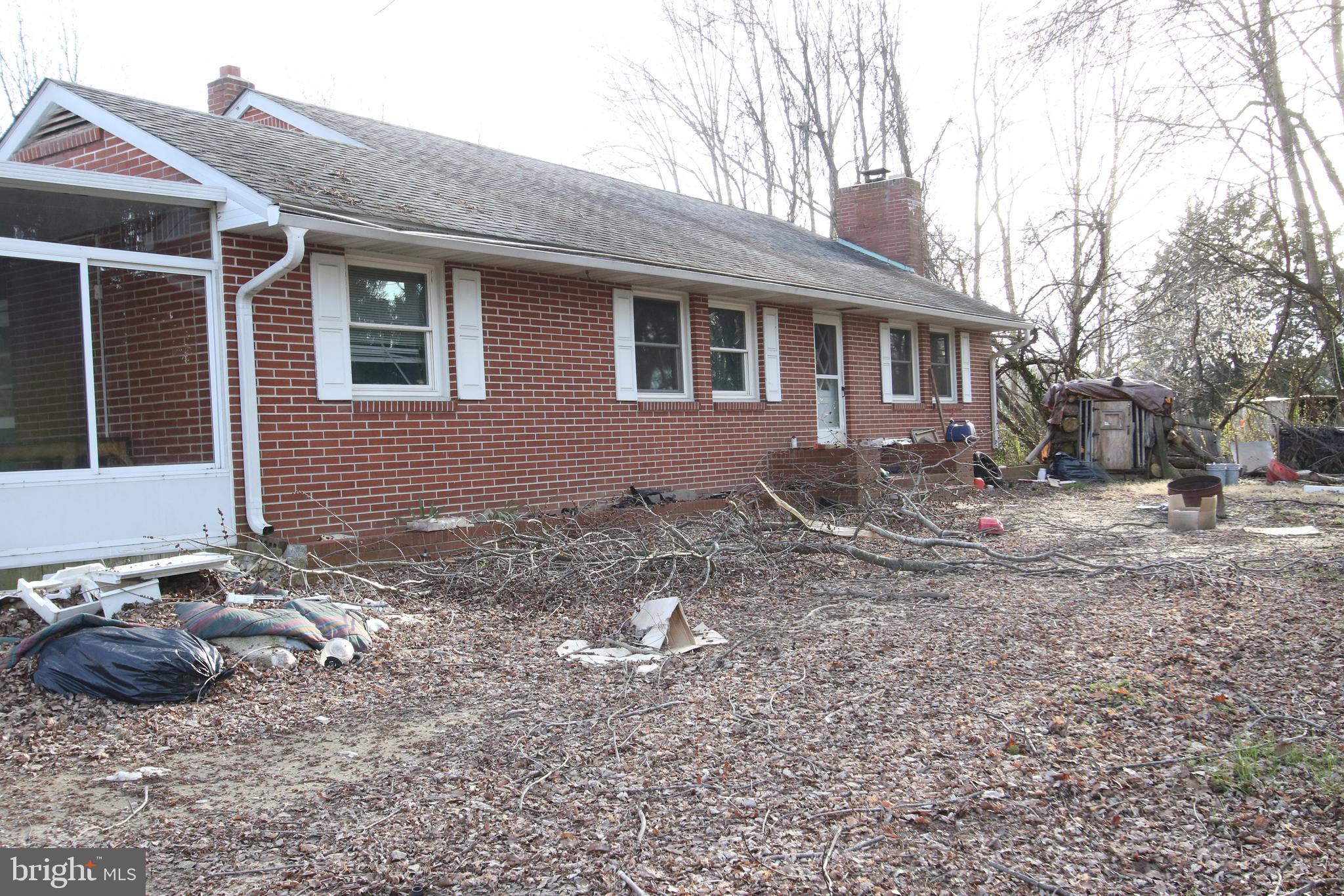 3576 Walnut Shade Road Camden Wyoming, DE 19934 - Photo 21 of 37 a backyard of a house with table and chairs