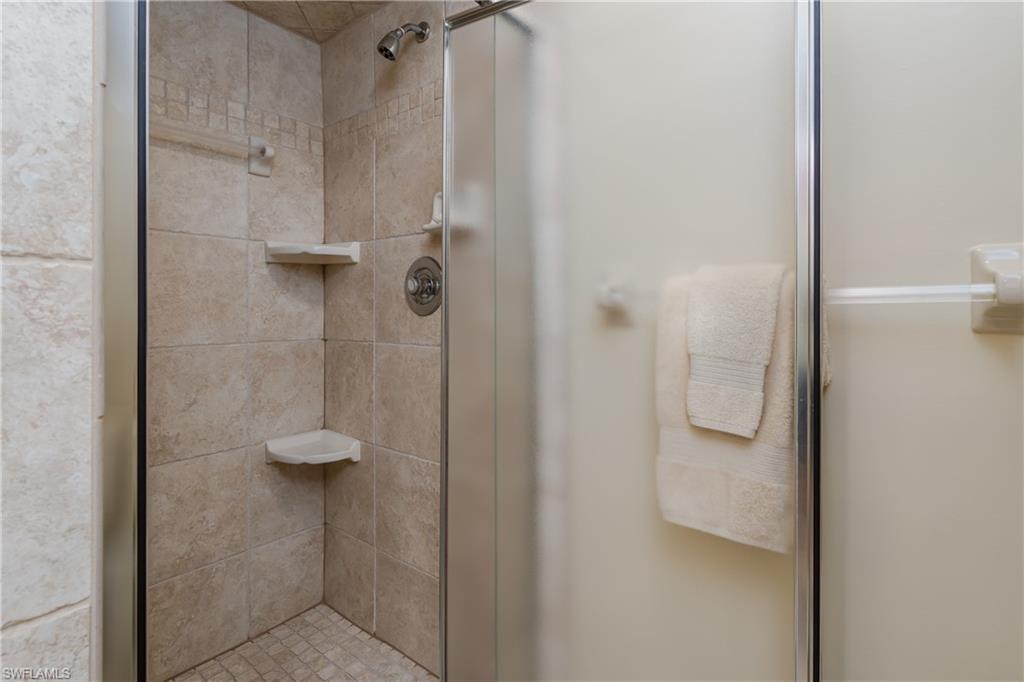 1850 West Crown Pointe Boulevard, Unit A103 Naples, FL 34112 - Photo 12 of 23 Master Bath