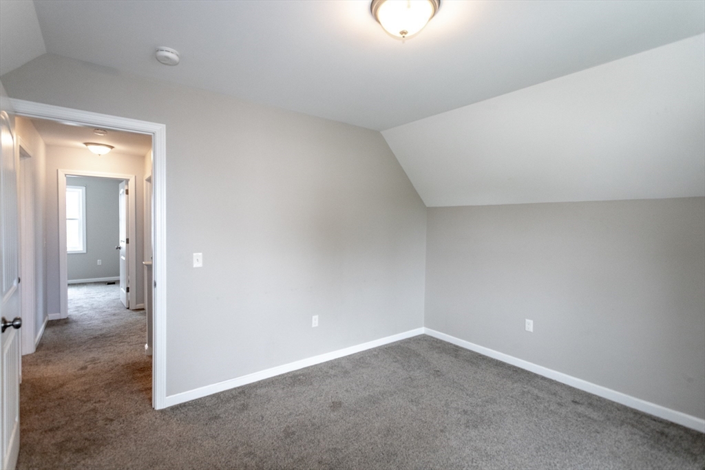50 Edbert Street Chicopee, MA 01020 - Photo 22 of 42 an empty room with a natural light