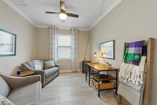 a living room with furniture and a window