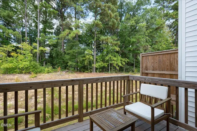 a view of a two chairs on the deck