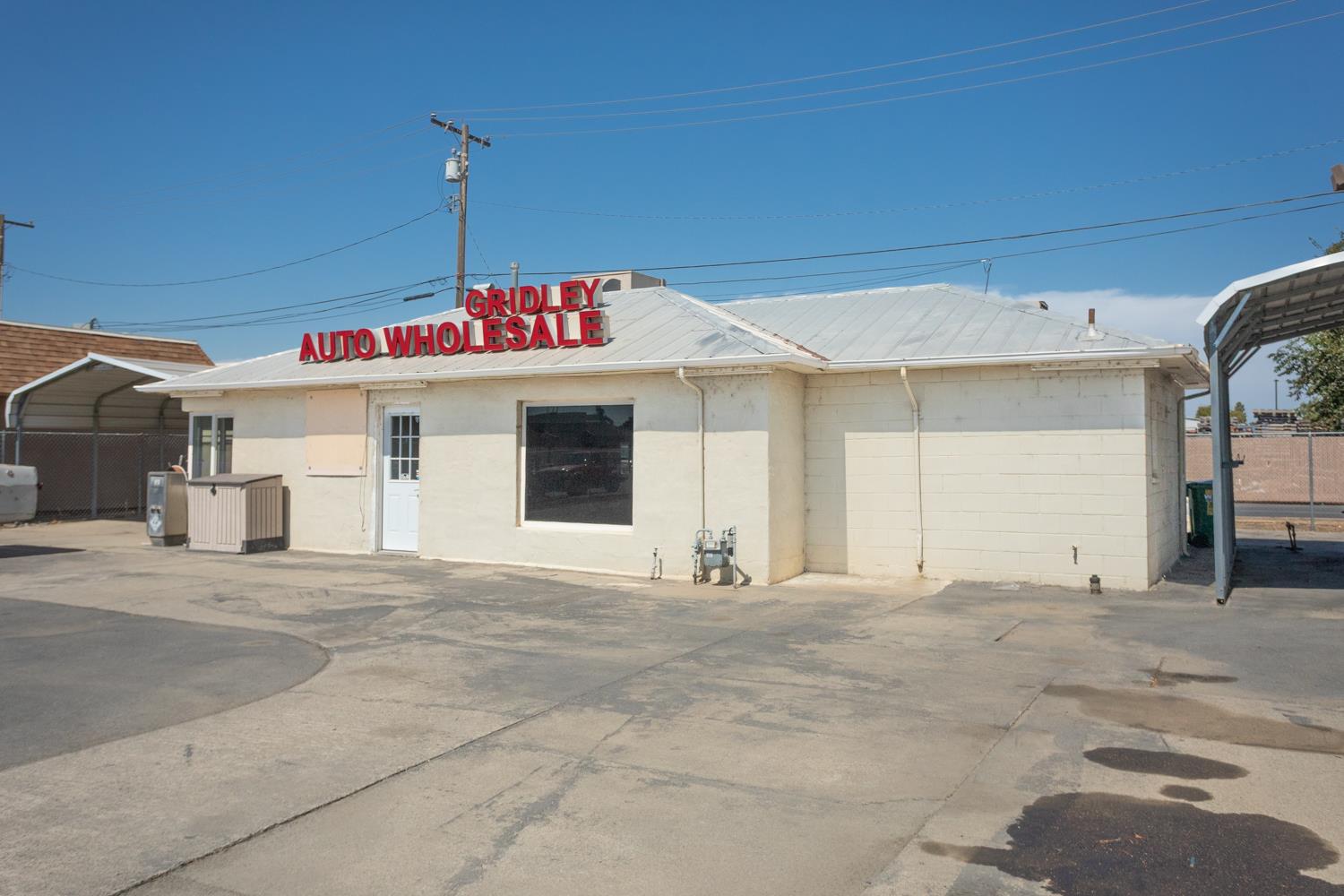 33 East Gridley Road Gridley, CA 95948 - Photo 16 of 50 a sign on the side of a building